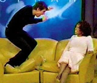 Tom Cruise jumps on Oprah's couch